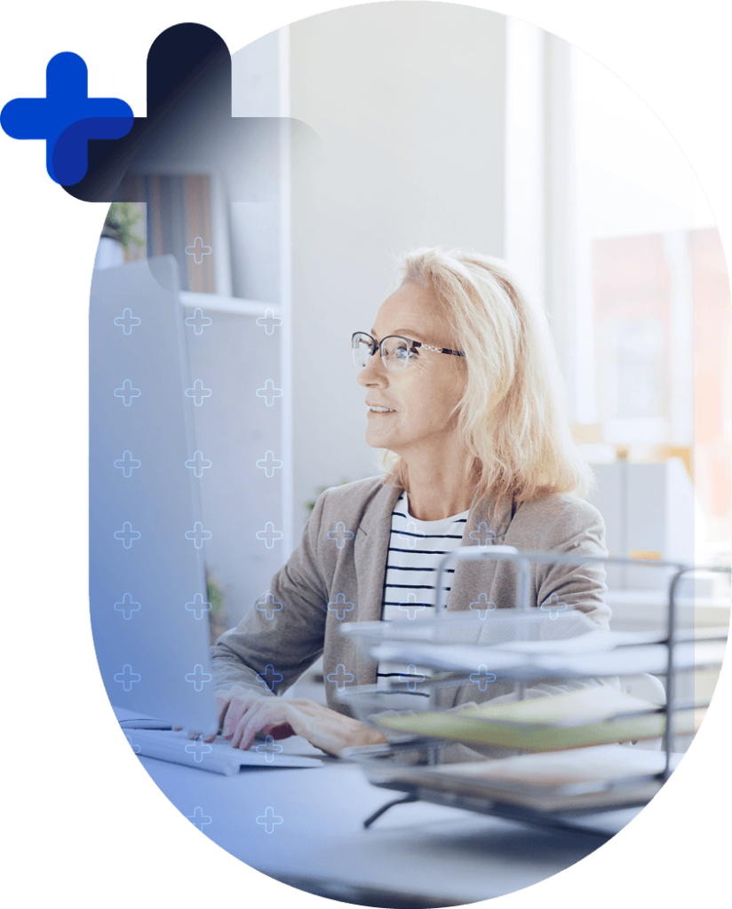 Business woman with glasses utilizing Genie payroll solutions on laptop